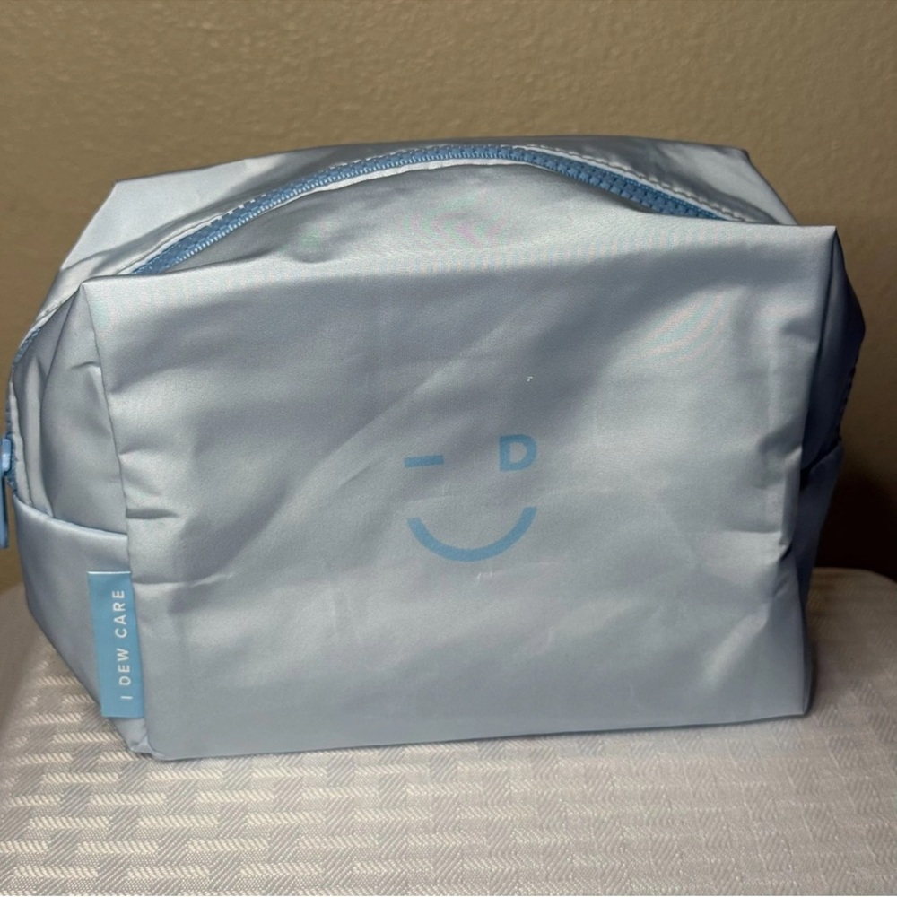 Light Blue Dew Care Logo Cosmetic Pouch